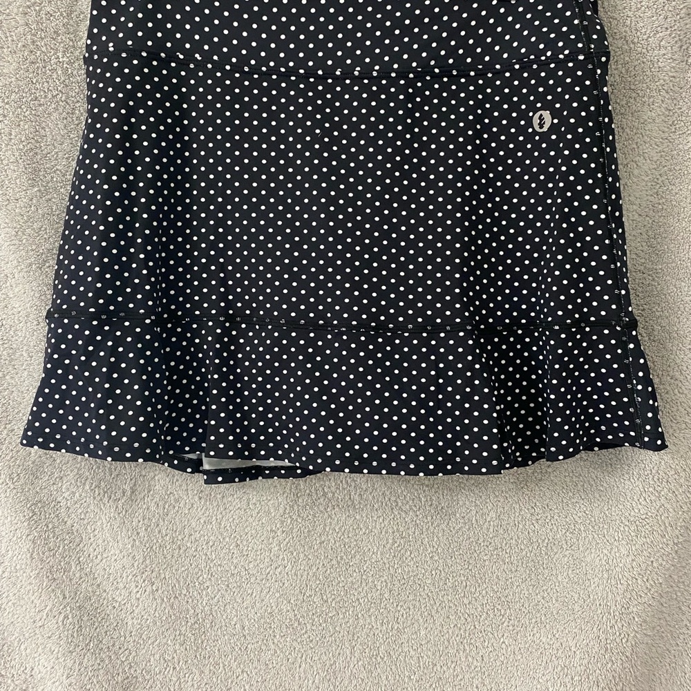 DonaJo size 3 JoJo polka dot tennis skirt with black shorts.